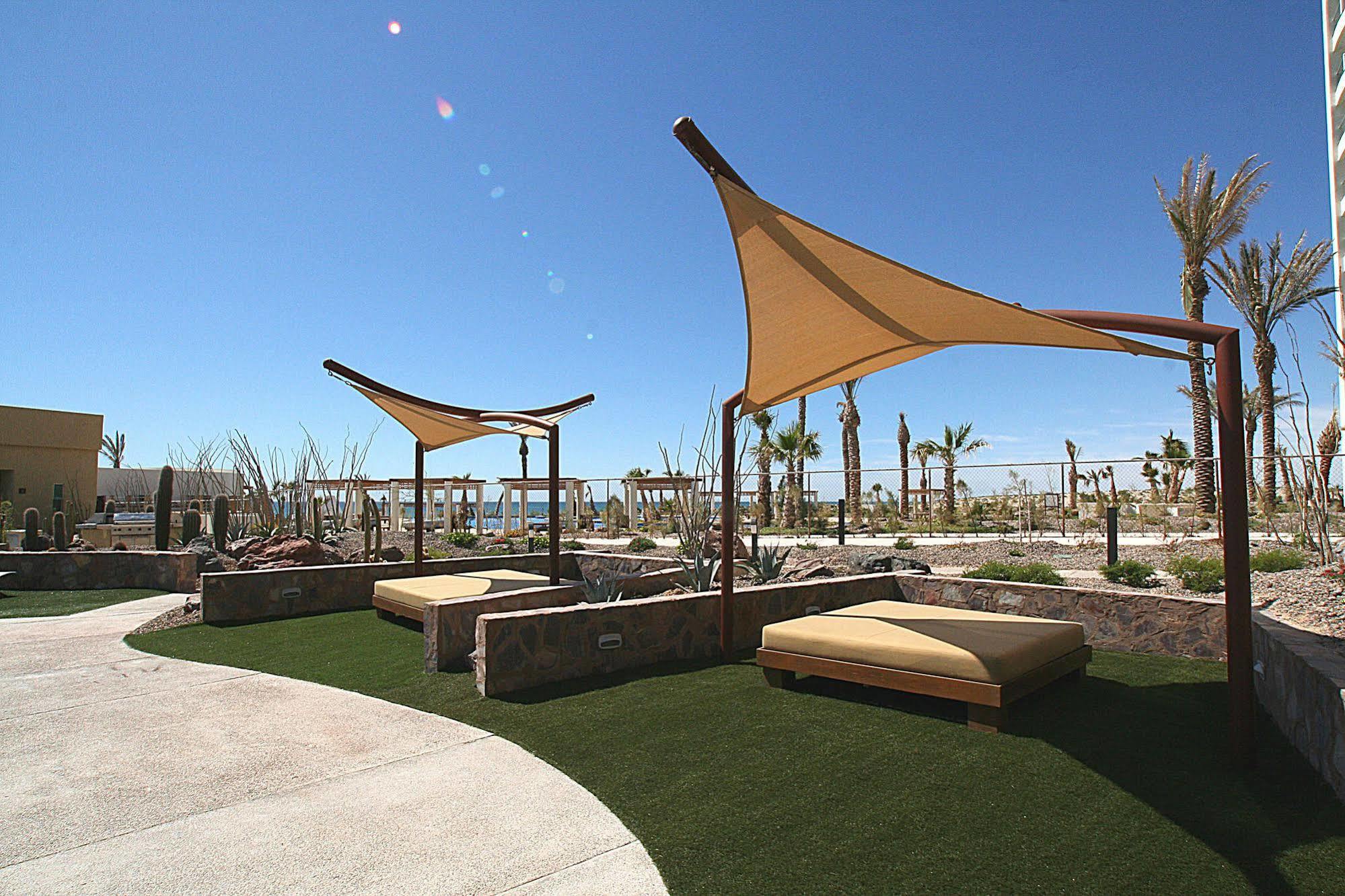 Encanto Living Penthouse By Kivoya Rocky Point Exterior photo